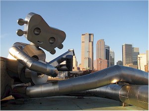 The Banjo Man, with Downtown Dallas in the Background